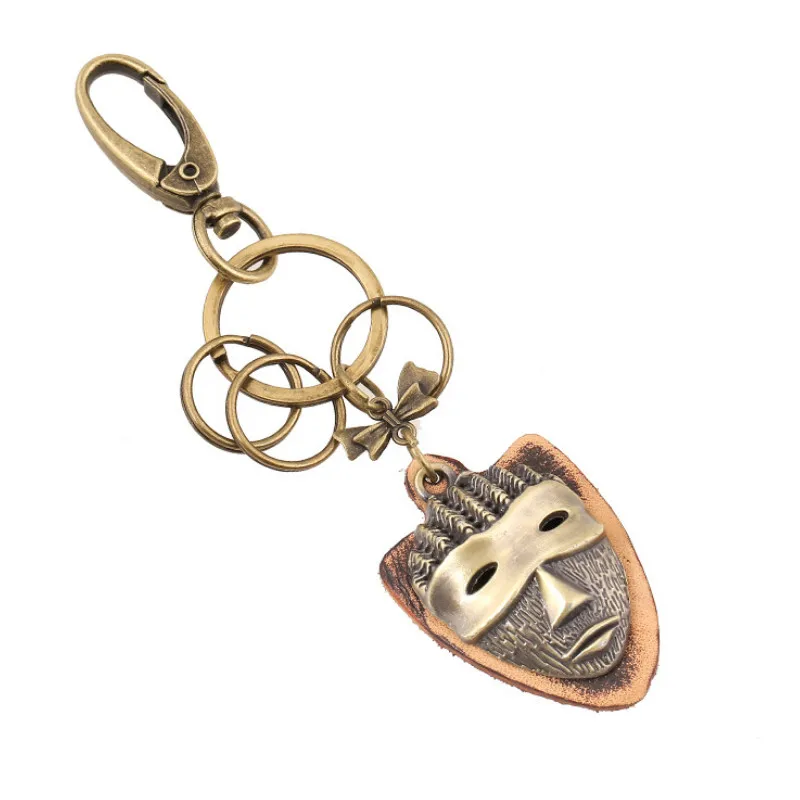 

Punk Fashion Metal Keychain Unisex Casual Car Keyring Vintage Mask Pendant Bag Car Key Chain Genuine Leather Holder Jewelry Gift
