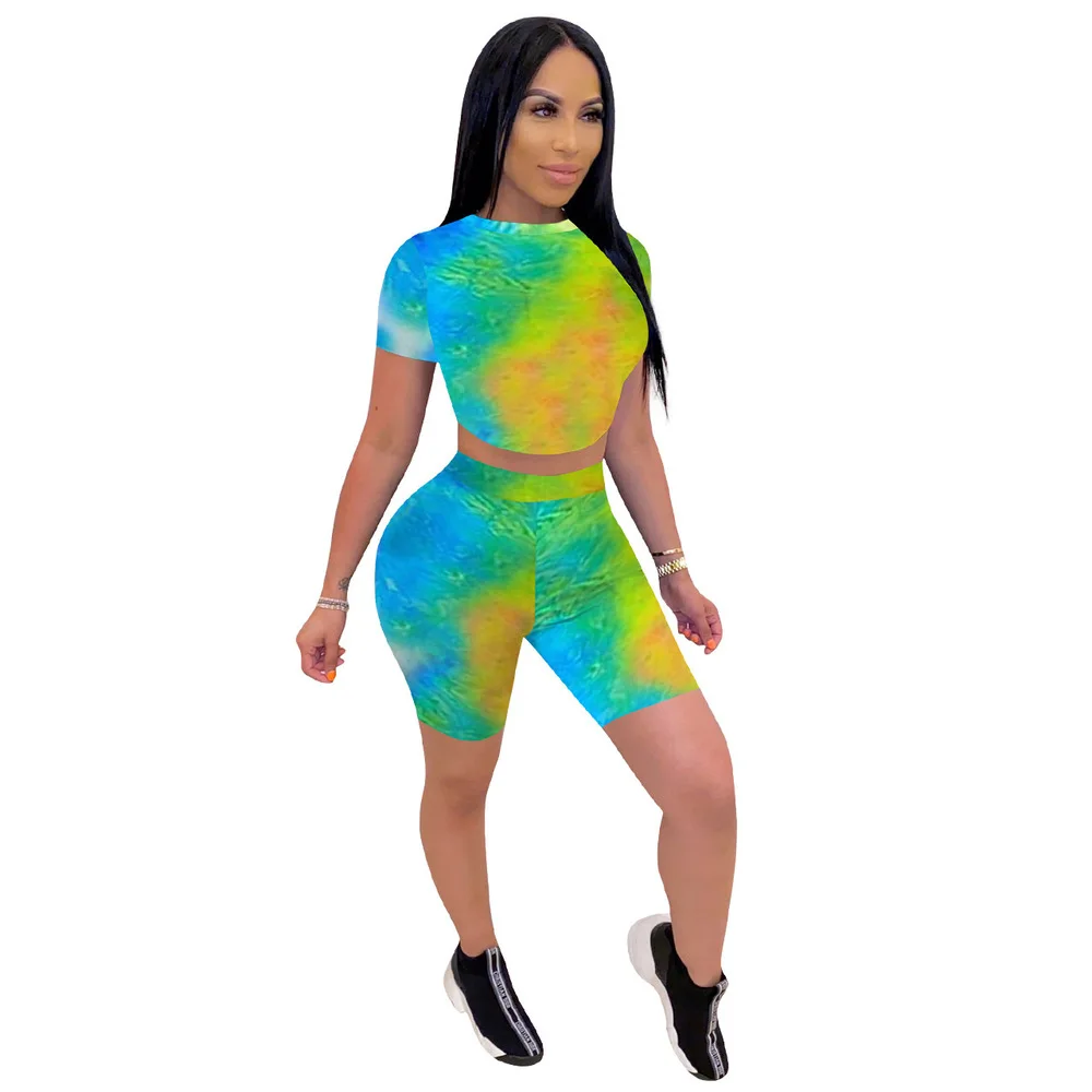 

Rainbow Tie Dye 2 Piece Outfit Women Clothes 2021 Short Sleeve Backless Crop Top And Biker Jogger Short Summer Tracksuit Suits