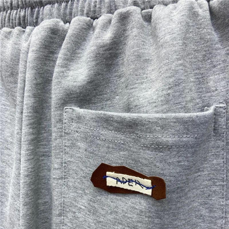 

Spring And Summer Couple Label Splicing Blue Ribbon High Quality Ader Error Casual Shorts