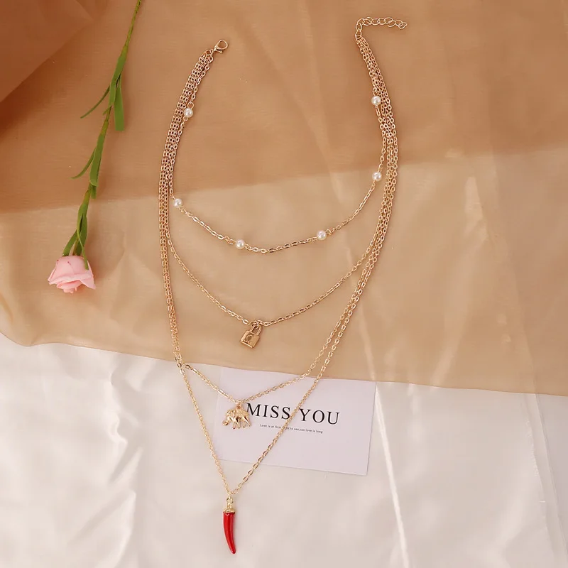 Винтажное многослойное жемчужное ожерелье с красным перцем и замком в виде слона