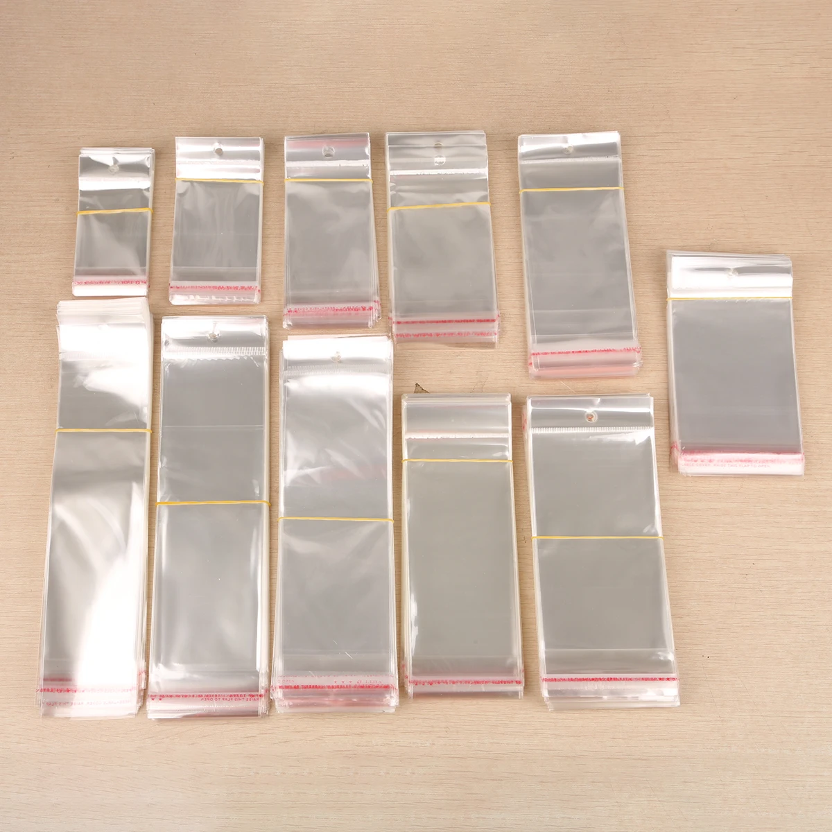 

100Pcs Transparent Self Adhesive Seal OPP Plastic Cellophane Bags Gifts Bag&Pouch Jewelry Packaging Bag With Hang Hole