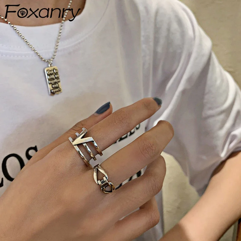 

Foxanry Minimalist Silver Color Width Rings for Women New Fashion Creative Letter V Hollow Geometric Party Jewelry Gifts