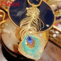 high end luxury metal decorations modern fashion 22k gold peacock feather pendant decorations for home