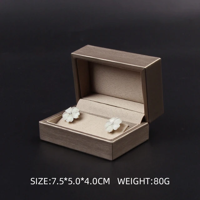 

Золотая кожаная шкатулка для украшений Baby.Xin