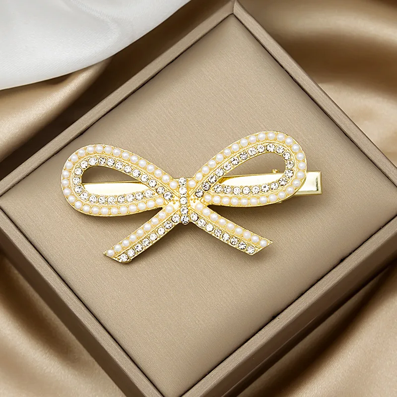 

New 2021 Magical, exquisite and elegant pearl tassel hairpin bow duckbill clip angel wing side clip