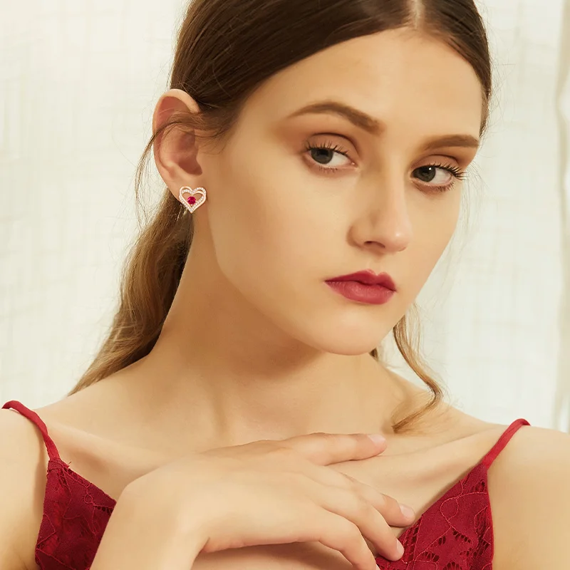 Женские золотые серьги Cdyle украшенные розовым кристаллом от Angel красивые