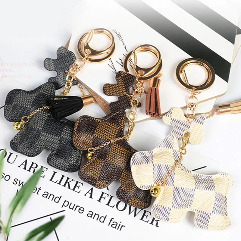 

Cute Leather Dog Keychains Car Holder Bag Pendant Keyring Leather Tassels Bell Key Chain for Women Charm jewelry Pendant Gifts