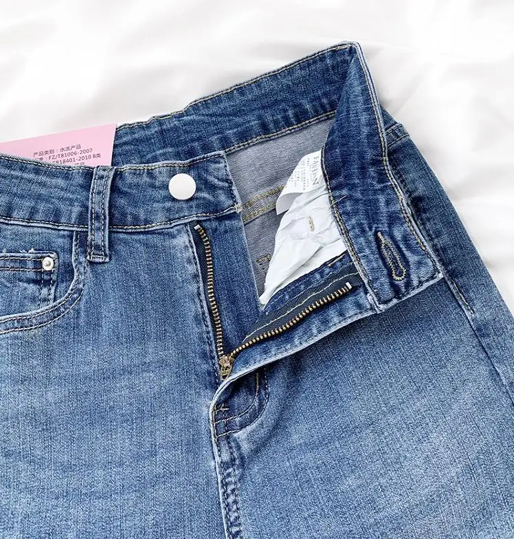 

Retro hole irregular straight leg pants slimming simple wind jeans
