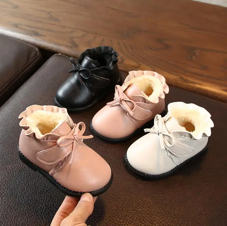 Зимние ботинки для малышей однотонные теплые короткие с бантом маленьких