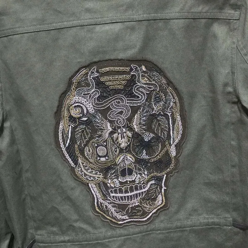 

2020 autumn and winter new back skull head nail tube beaded flannel jacket