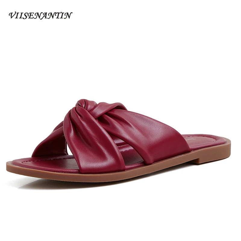 

2021 summer new leisure and comfortable open-toed leather slippers female flat cross strap beach vacation Roman sandals