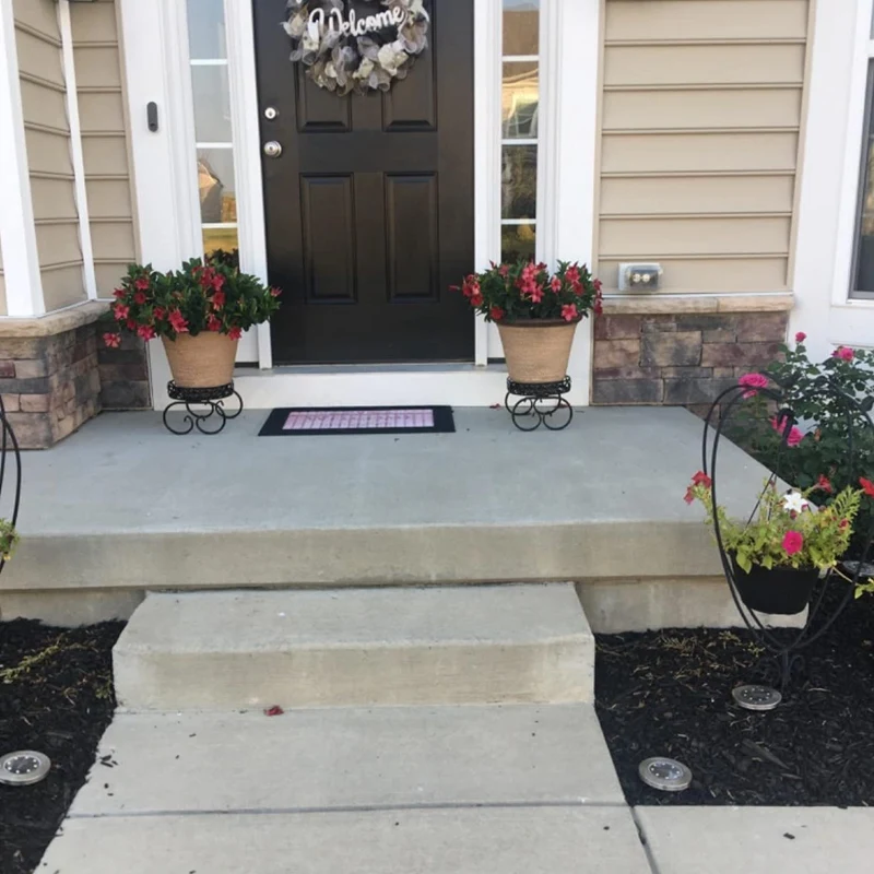 Поднятая металлическая подставка для горшков и растений сада крытого уличного