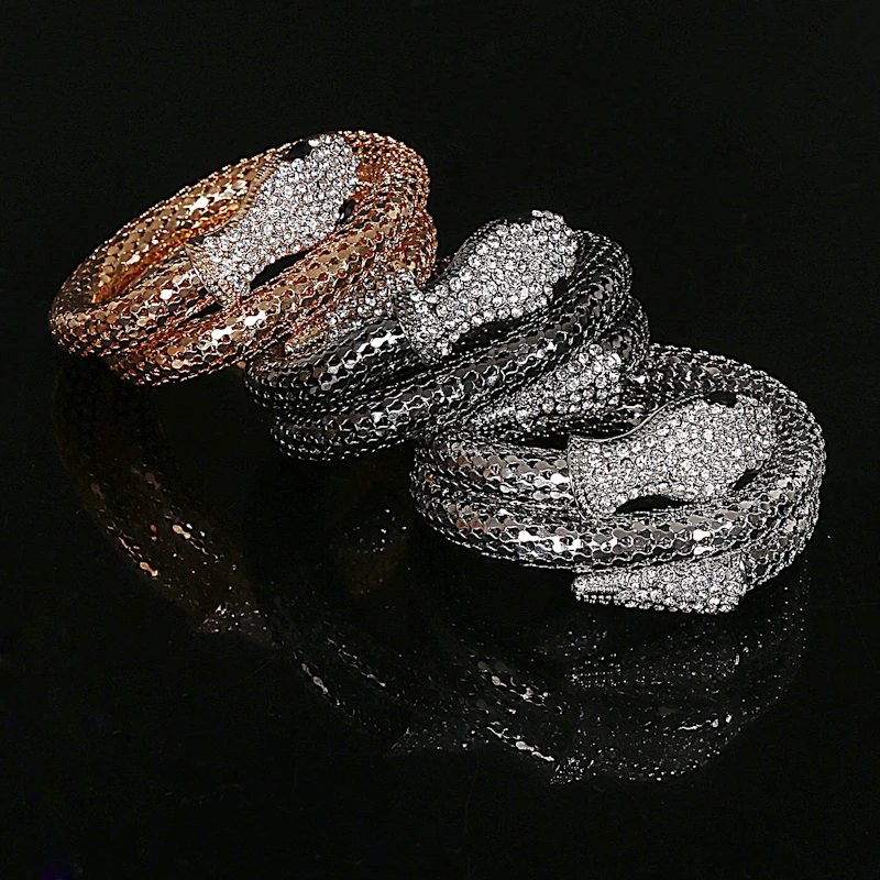 Женский браслет со змеиным плетением золотистый и серебристый на спирали в