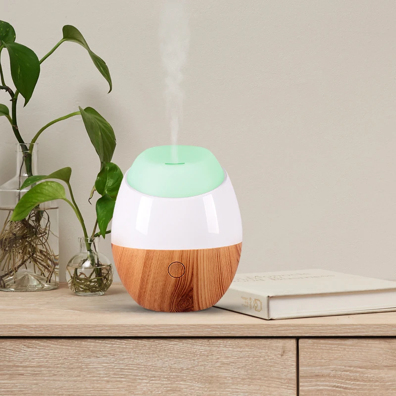 

Portable USB Aroma Diffuser Ultrasonic Diffusers Aromatherapy Essential Oil Diffuser Cool Mist Humidifier with 7 Color