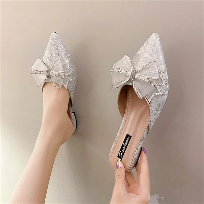 

Women's shoes slippers 2021 summer new pointed toe Baotou bow outer wear flat low heel sandals and slippers tide