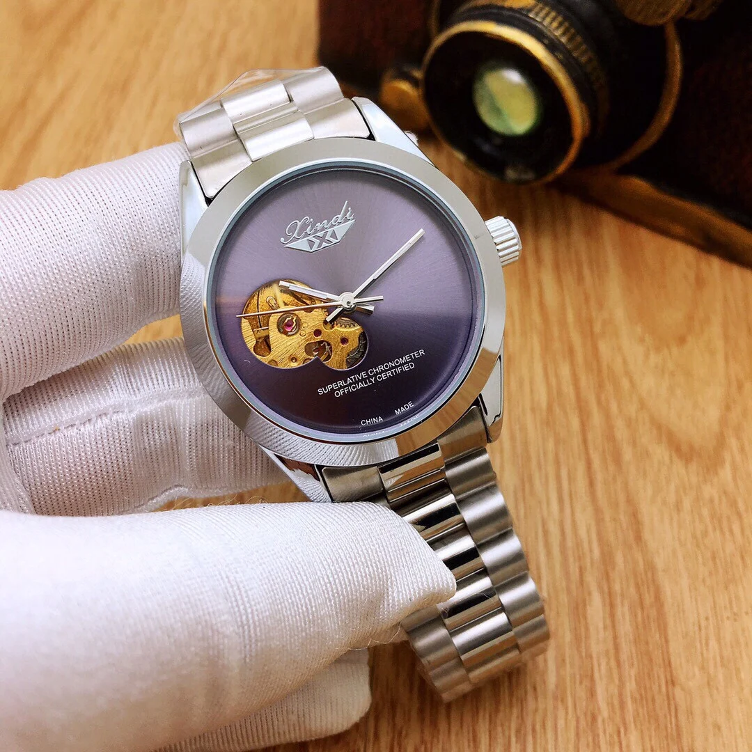 

Hot sale in gold style, simple round hollow men's mechanical watch with solid steel band 2021 new casual fashion business