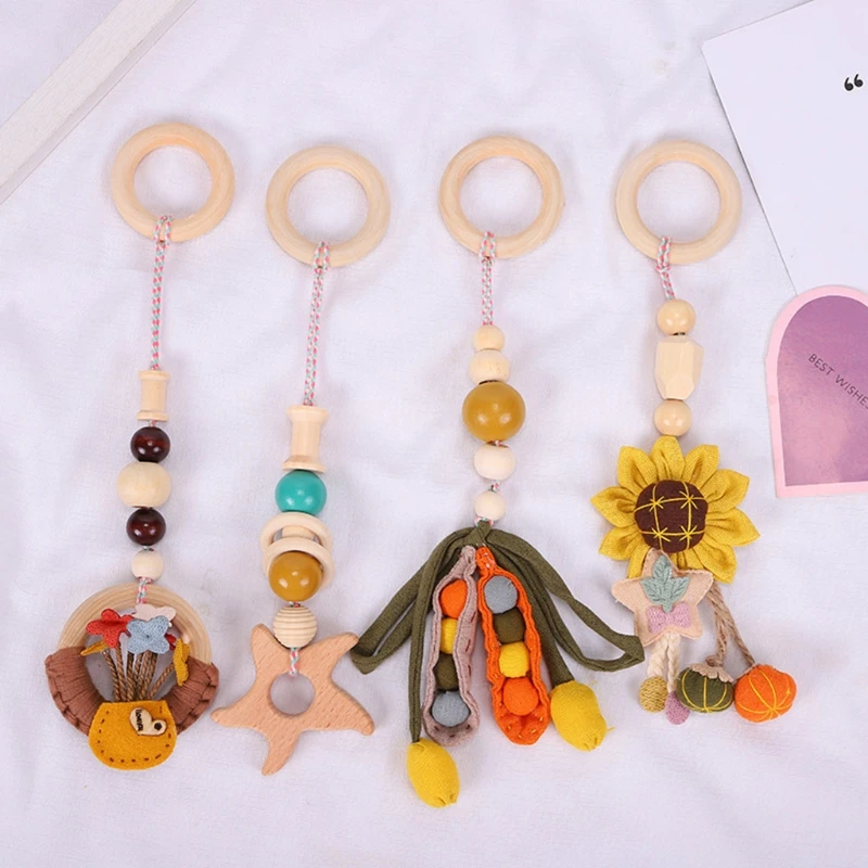 

4 Pcs/Set Baby Play Gym Frame Stroller Hanging Pendants Wooden Ring Teether Molar Teething Nursing Rattle Toys Gifts Infant Roo