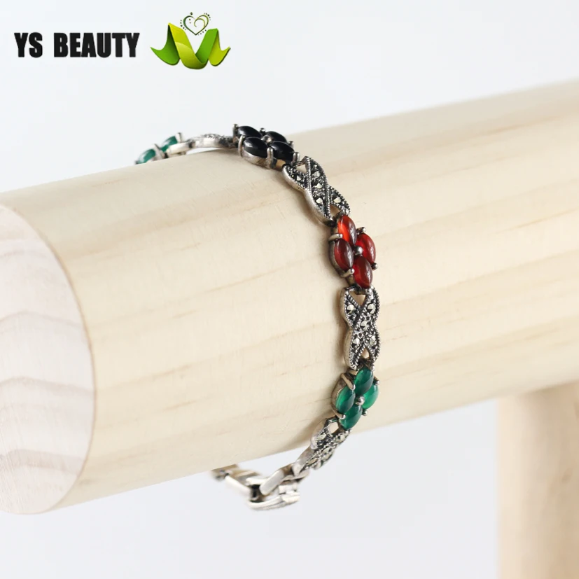 Браслет из серебра 925 пробы с инкрустированными цветными драгоценными камнями