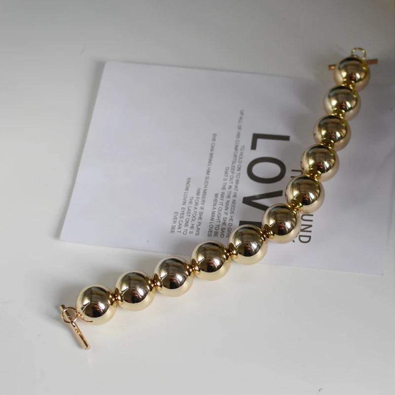 Золотистый ремешок большого размера с шариками диаметром 25 мм дизайнерская