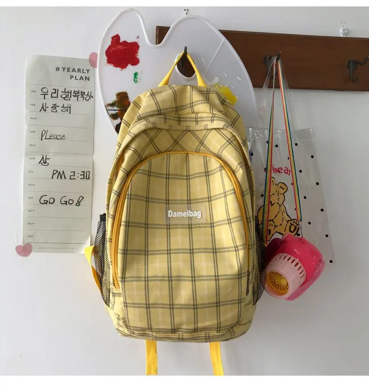 

Sen department simple joker small fresh plaid literary style sweet girl joker backpack college wind student schoolbag