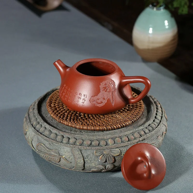 

Yixing handmade quality purple clay teapot raw material Dahongpao kungfu tea set Zen Heart Stone ladle teapot