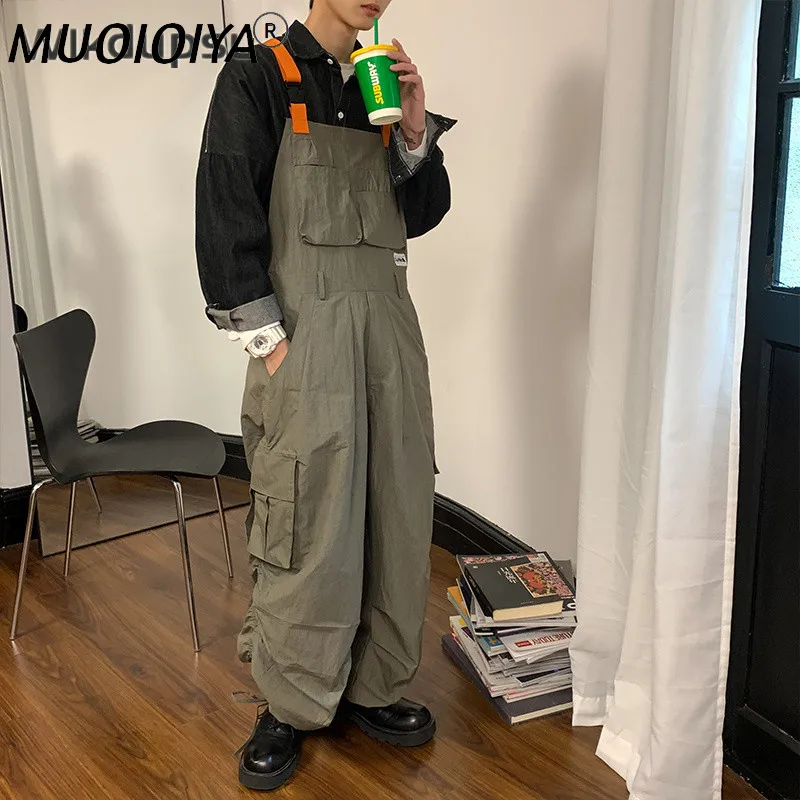 

Trendy Pockets Overalls Streetwear Jumpsuits Men Fashion Stylish Joggers Suspender Jumpsuit Male Casual Loose Romper Pants