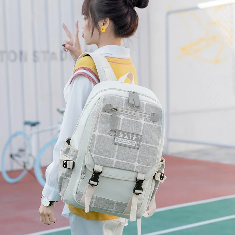 

new backpack female Korean version of campus junior high school students' schoolbag leisure fashion outdoor travel backpack.