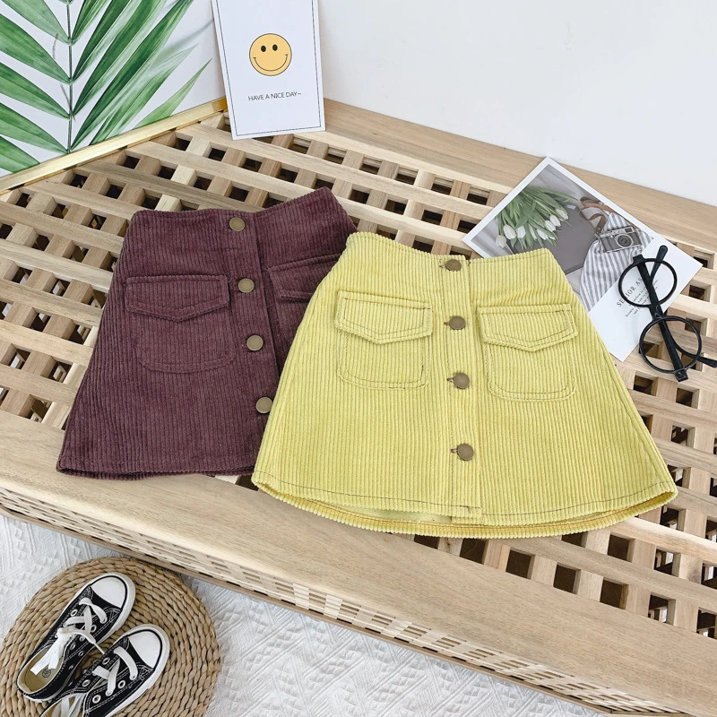 

Children's Clothing Autumn Winter New Baby Girls Skirts Kids Fashion Button Pocket Corduroy Skirt For Girl Toddlers Mini Skirt