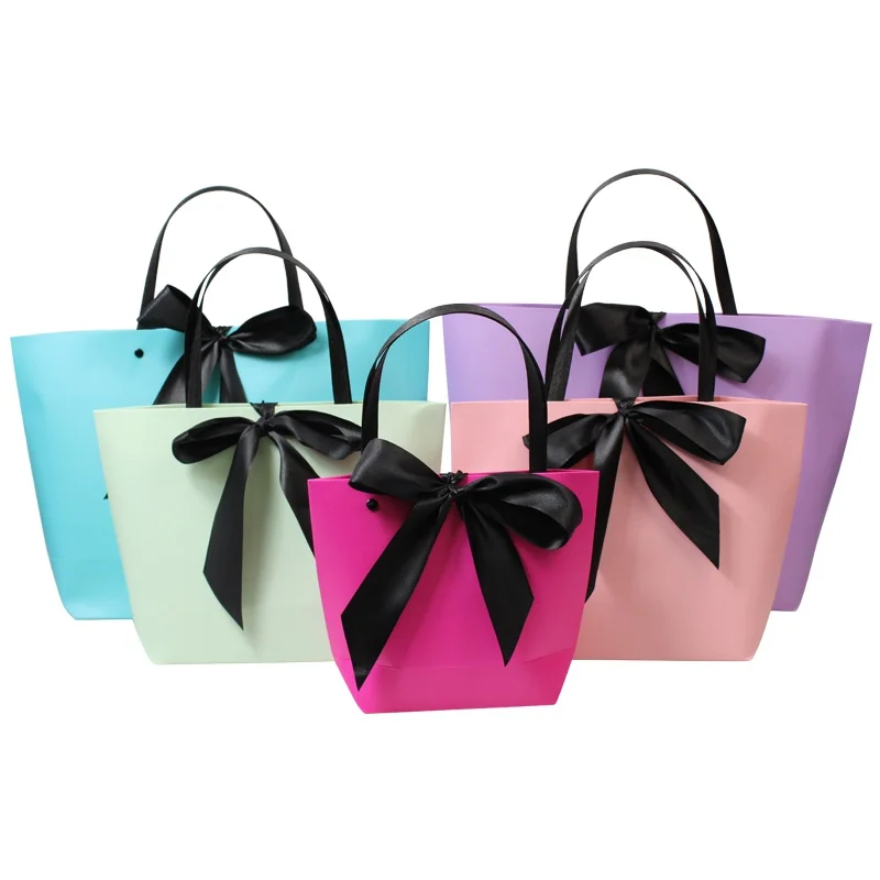 

10Pcs Bow Ribbon Gift Bag Recyclable Diy Favor Paper Bags for Clothes Wedding Birthday Party with Handle Celebration Decor