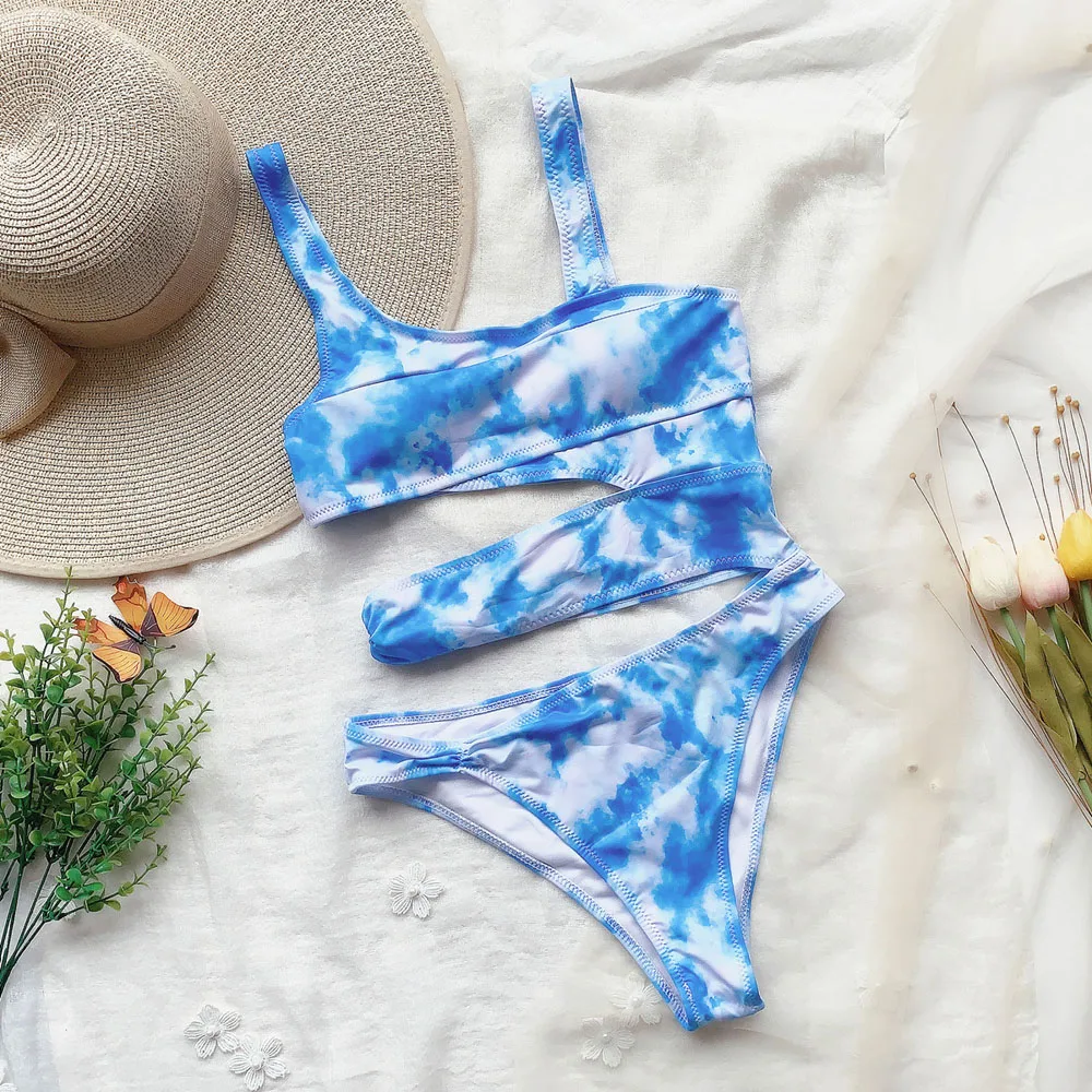 

2019 white hollow out swimsuit of a tall female piece women's swimwear out bodysuits one-piece suit lot