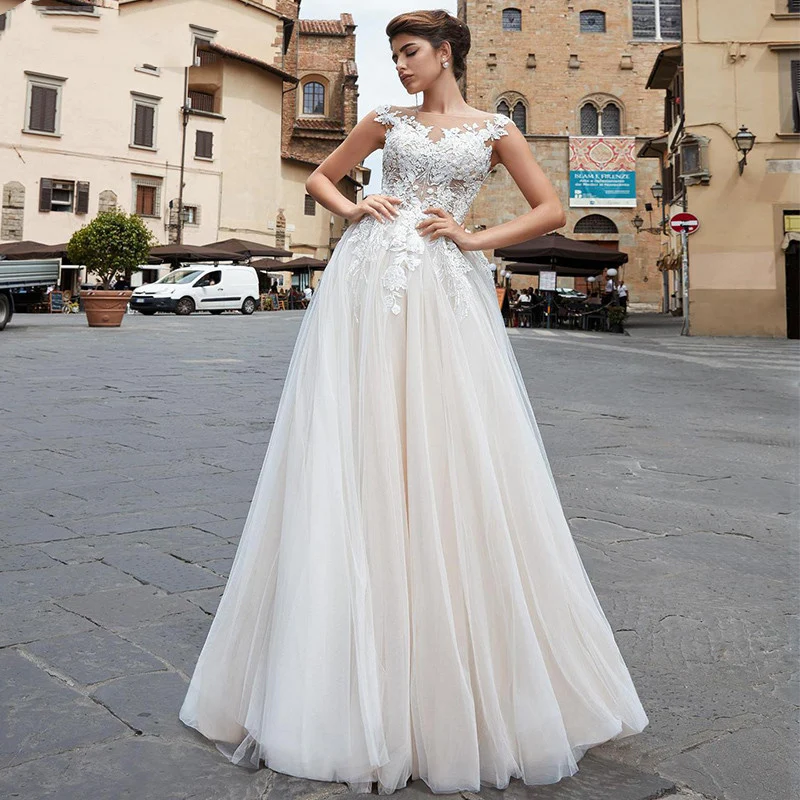 

Champagne Bohemian Wedding Dresses Lace Appliques Cap Sleeves Illusion Scoop Cap Sleeves A Line Bride Gowns свадебное платье