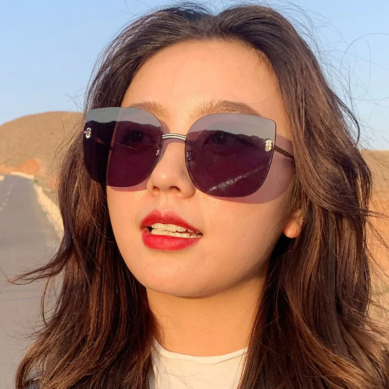 

2020 New Frameless Trim Women Sunglasses Classic Metal Glasses Frame Cat Eye Madam and Men Out Door Driving Sun Glasses Uv400