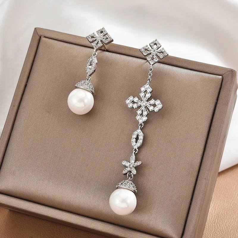 

Light Luxury Fashion European and American Trendsetter Wedding Earrings Long Asymmetric Pearl Cross Earrings Earrings MYWINY