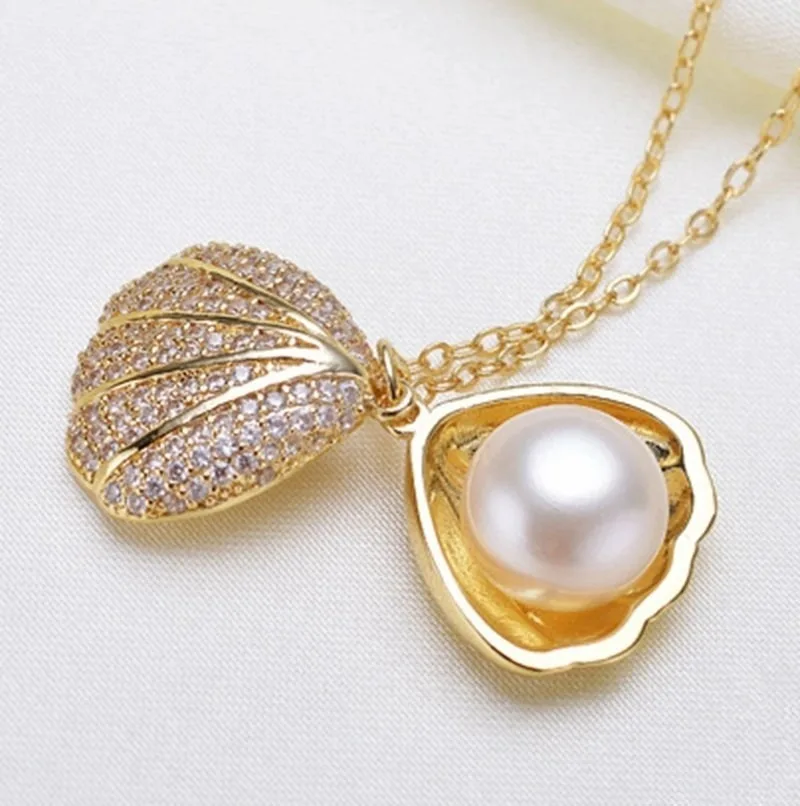 030154 с жемчугом. подвеска жемчужина в ракушке. подвески с жемчугом из серебра. подвеска с жемчугом серебро. подвеска с жемчугом из ракушки.