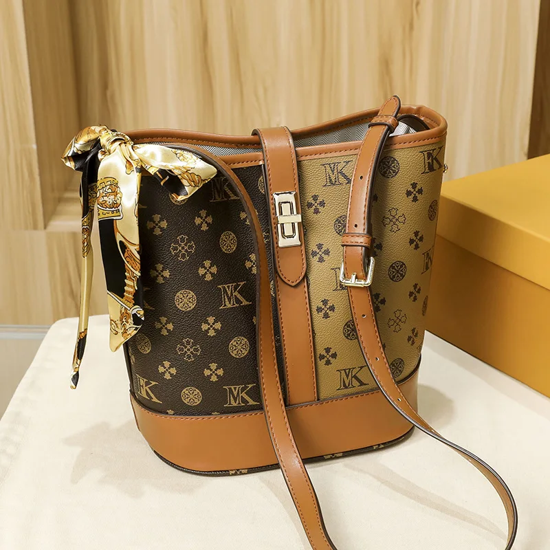 

Luxury new ladies leather large-capacity bucket bag messenger bag leather hit color bag/handbag shoulder bag