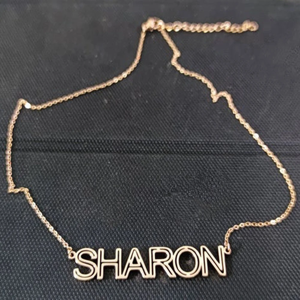 

2021 New Ladies Golden Hollow Name Necklace Custom Stainless Steel Letter Pendant Necklace Female Simple Personality Jewelry
