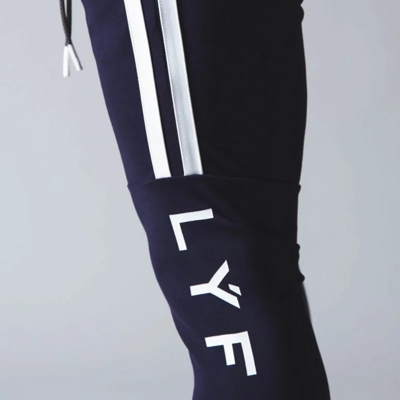Спортивный шланг для бега Hosen Männer Sport Jogger фитнеса Neue Mode gedrackt Muscle Men Fitness Training