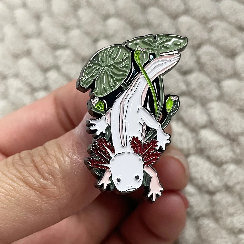 

Cute Colorful Axolotl Herpetoflora ​Hard Enamel Pin Brooch Cute Little pink axolotl swimming around some lily plants badge