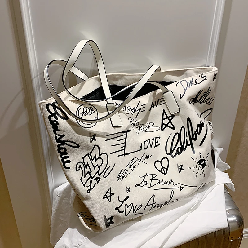 

Women's graffiti canvas portable large capacity bag 2020 new fashion one-shoulder shopping bag