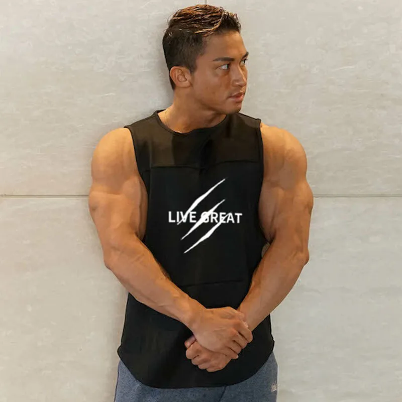 

2019 new male sports vest round neck solid color sleeveless men's summer men's bodybuilding vest running fitness vest loose ty