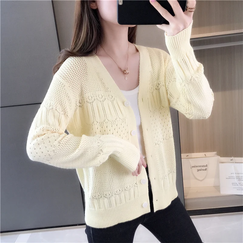 

20095 (room 5, Row 6, No.7 Middle) ice silk solid color V-neck hollow knitted cardigan 42