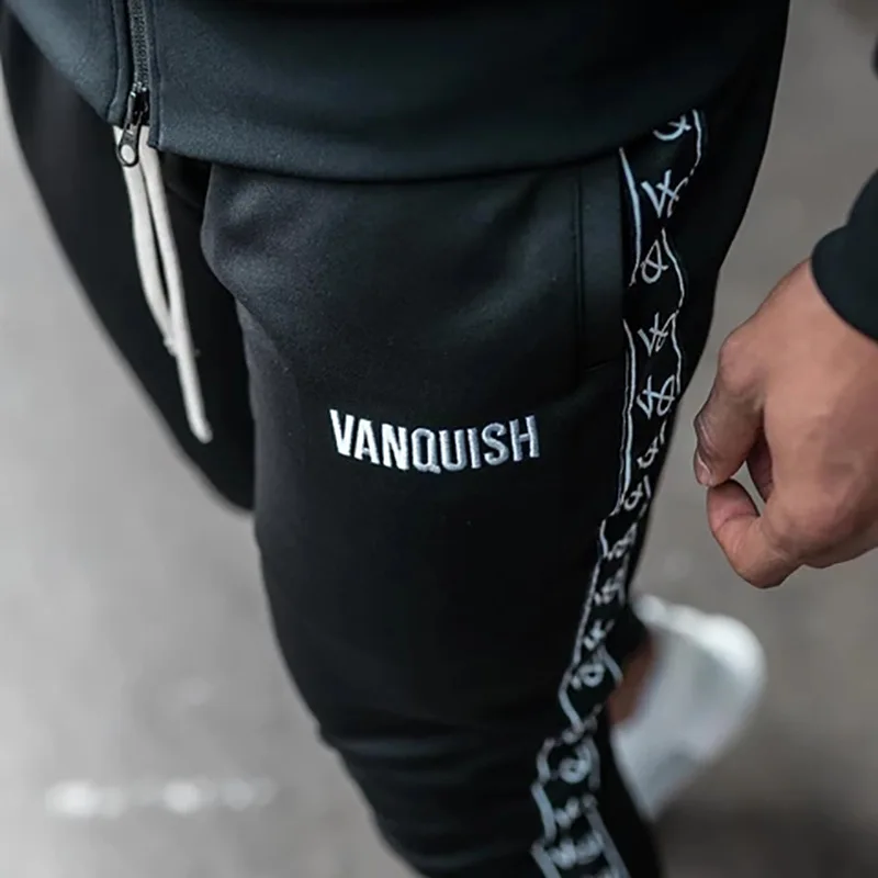 

Muscle men's ins side letters block contrast European and American fitness pants men's slim leisure sports pants