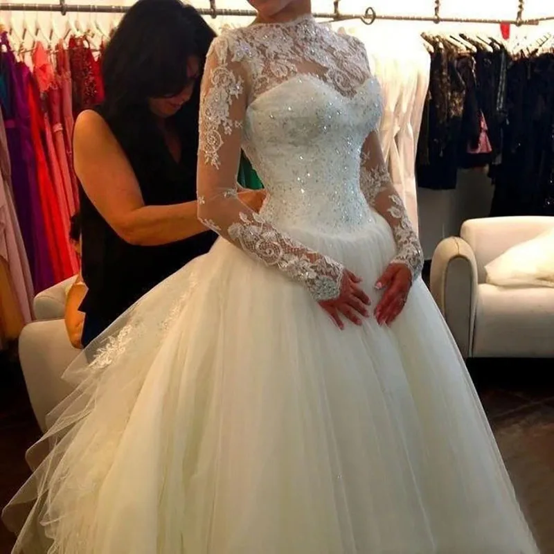 

Boat Neck Tulle Applique Beaded Court Train Bridal Wedding Dress Sexy New Transparent Lace Long Sleeve Open Back A-line wedding