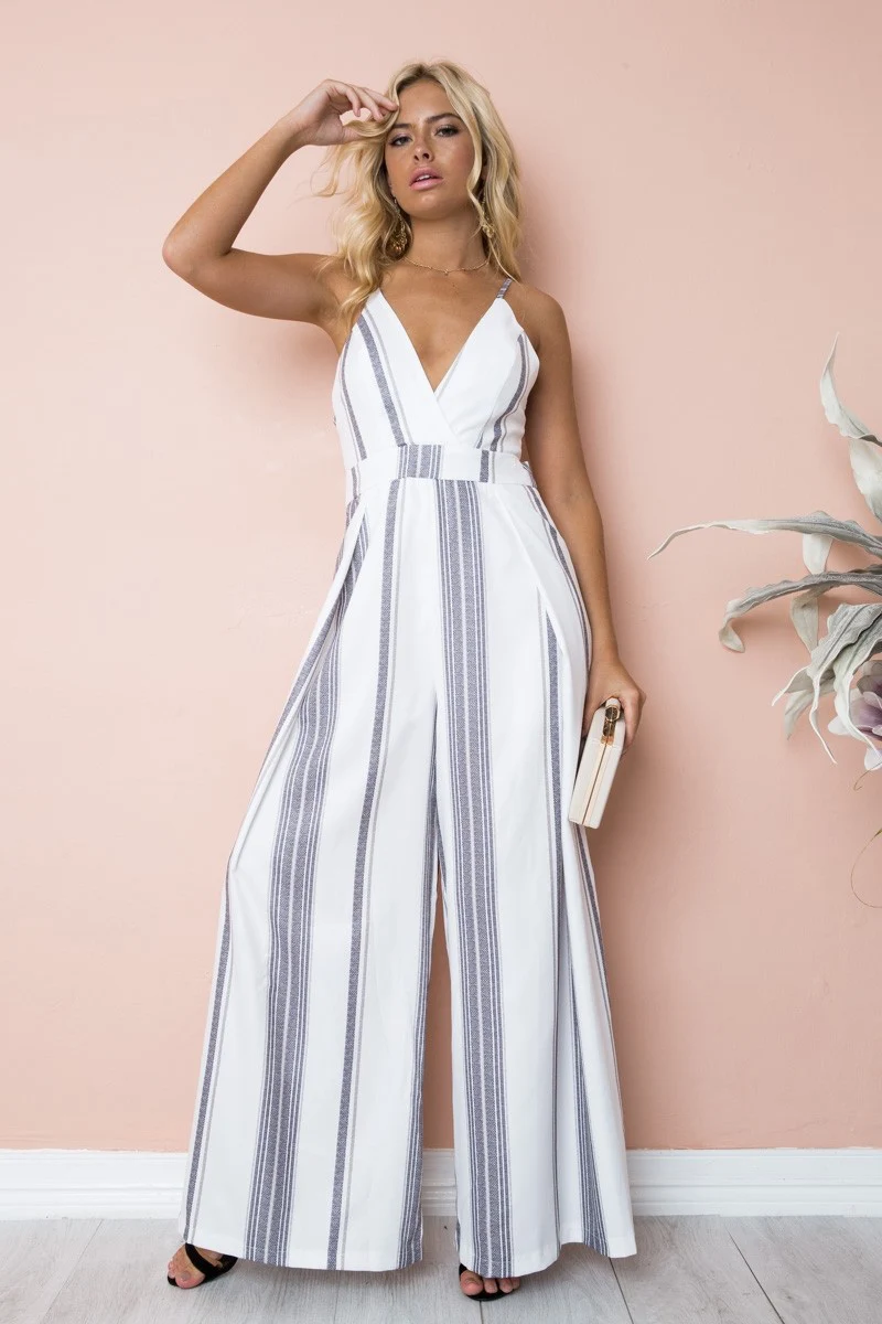 Nadafair Boho Цветочные Комбинезоны для женщин V образным вырезом спинки Лук ремень Летний Пляжный комбинезон длинные брюки
