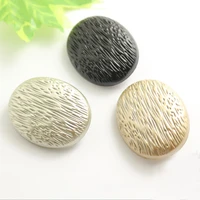 50 pcs high end cobblestone metal buttons fashion coat trench decorative buttons oval sewing on dress 20 35mm