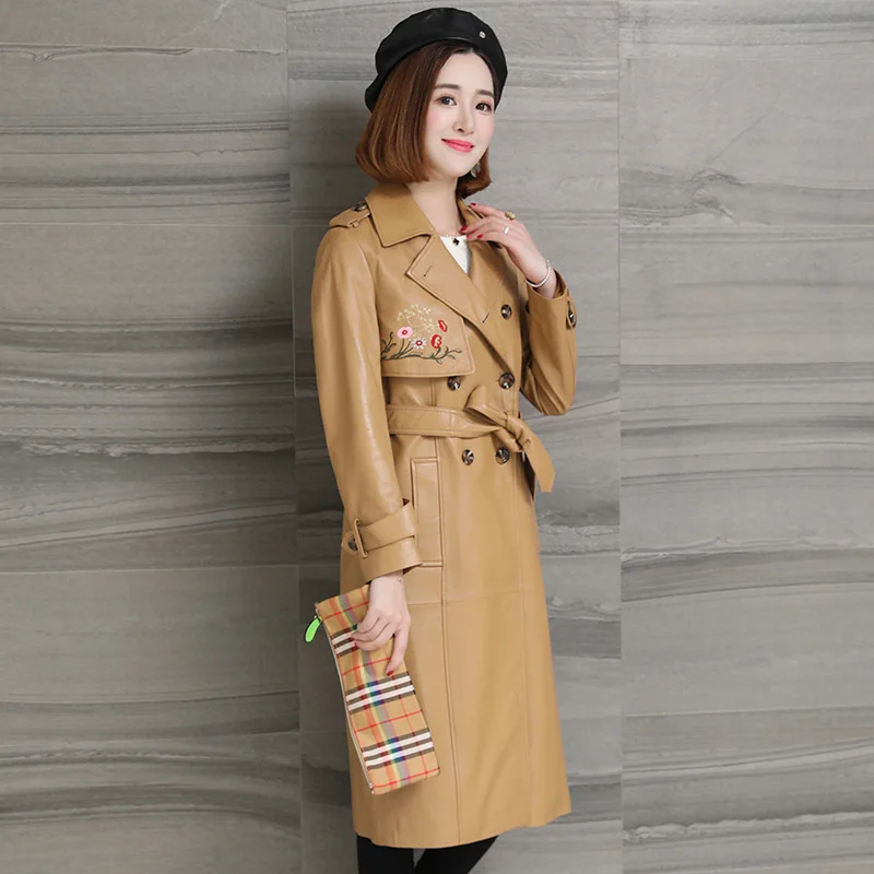 Chaqueta rompevientos larga bordada de piel de oveja para mujer, Abrigos de moda fina de cuero genuino con fajas, Otoño e Invierno