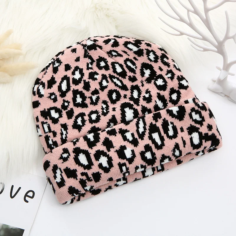 

The new winter Woman's knitted hat Leopard print headgear Curly-rimmed dome skin hat