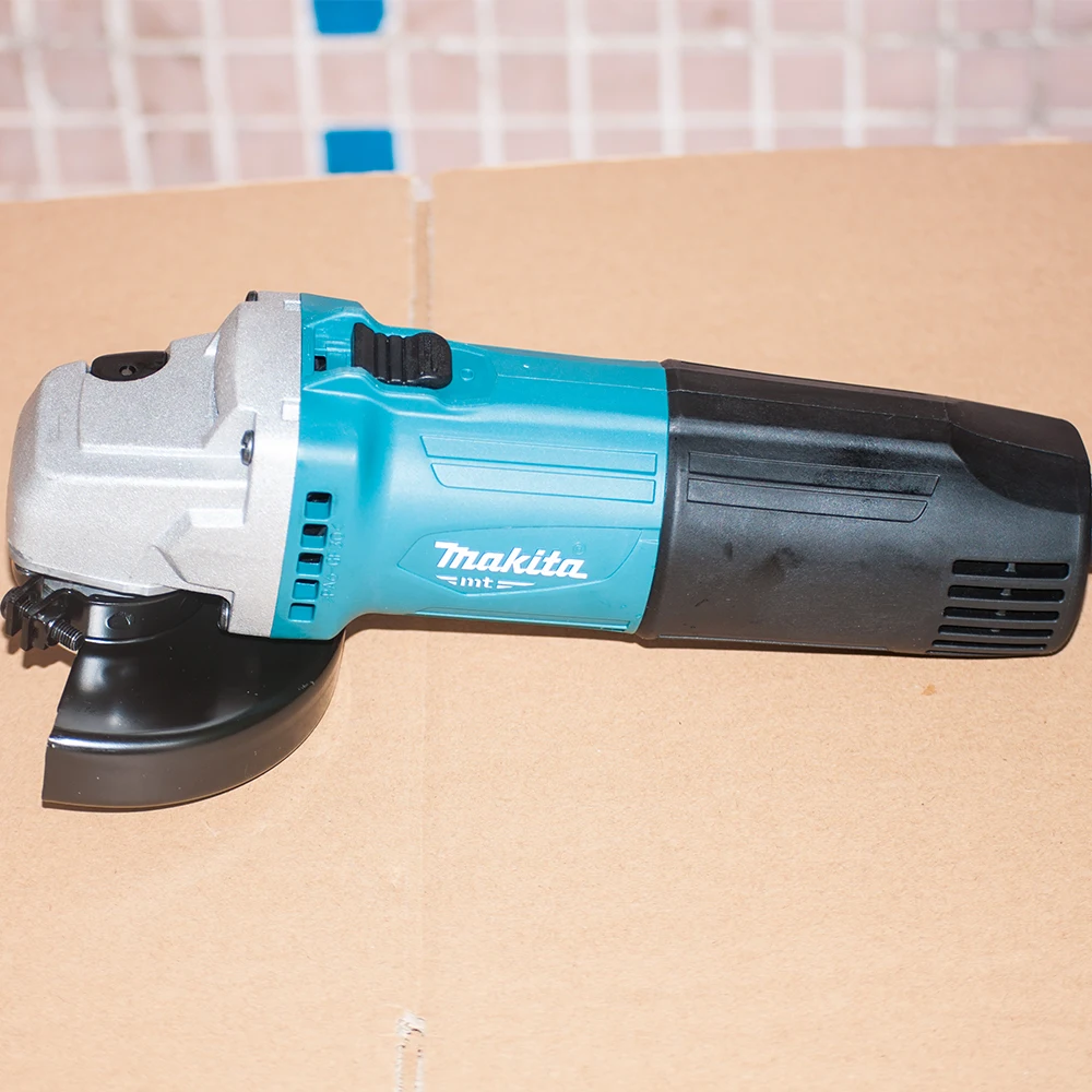 Японская угловая шлифовальная машина Makita M0900B мощностью 540 Вт ручная полированная