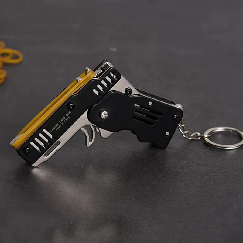 Mini Folding Stainless steel Rubber Band Launcher Gun Hand Pistol Guns Shooting Toy Gifts Boys Outdoor Fun Sports For Kids | Игрушки и