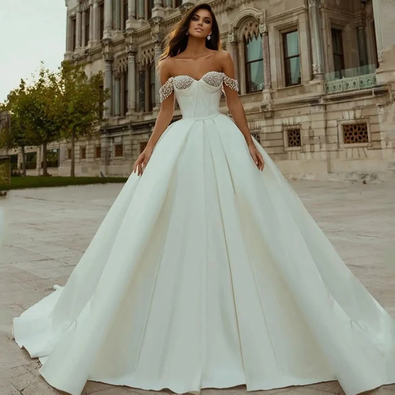 

Сексуальное Белое/цвета слоновой кости свадебное платье с открытыми плечами жемчужинами платье невесты русалка принцесса свадебные вечер...